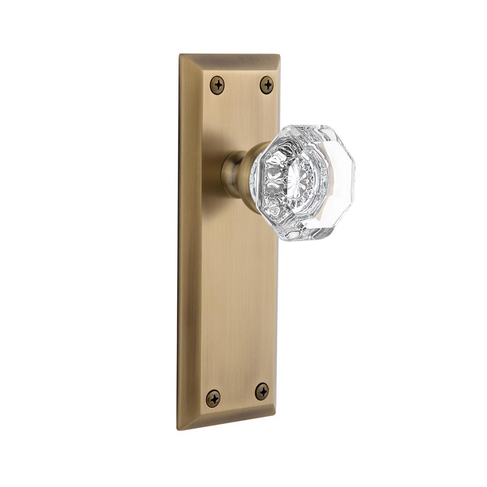 Grandeur by Nostalgic Warehouse FAVCHM Passage Knob - Fifth Avenue Plate with Chambord Crystal Knob in Vintage Brass